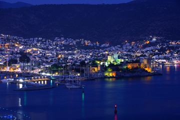 Fototapeta na wymiar View of Bodrum harbor and Castle of St. Peter by night