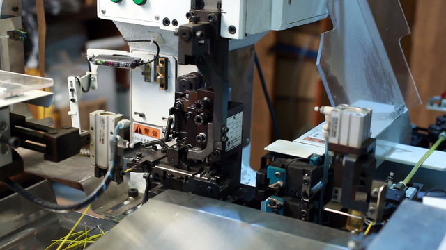 View of modern machine processes wire, close-up