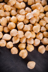 Chickpeas on wooden board