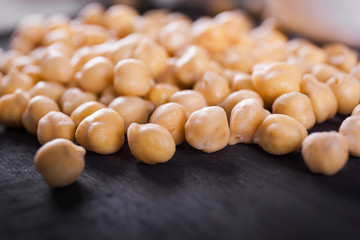 Chickpeas on wooden board
