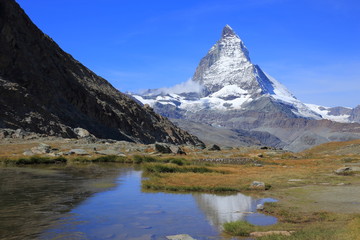 Naklejka na ściany i meble Matterhorn and beautiful lake in Switzerland