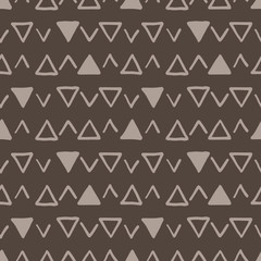 Vector seamless texture of hand-painted triangles