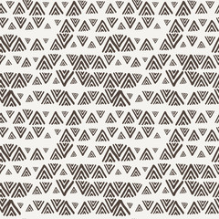 Vector seamless texture of hand-painted triangles