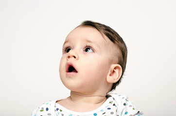 Baby looking up, infant waiting for parents, toddler listening his parents