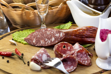 sausage on a wooden plate in a restaurant