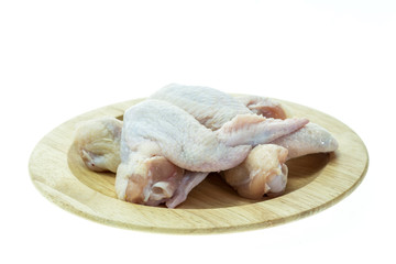 Raw chicken wings on a white background