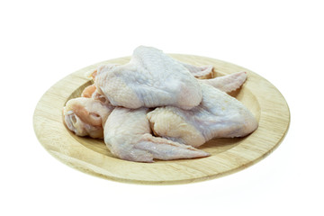 Raw chicken wings on a white background