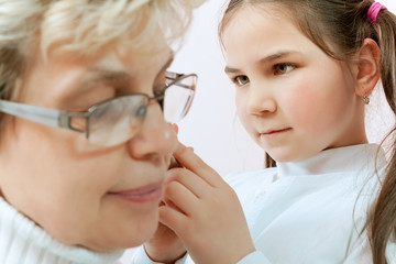 Doctor examining a child in a hospital