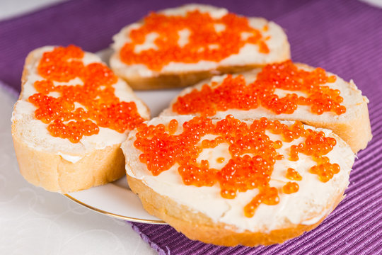 Appetizer of Caviar on Slices of Baguette Bread