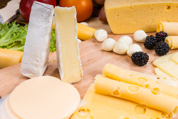 Gourmet Cheese Board Garnished with Berries