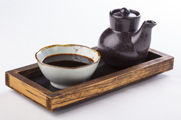 Teriyaki sauce on a tray © hansgeel