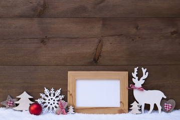 Fototapeta premium Christmas Decoration On Snow With Picture Frame