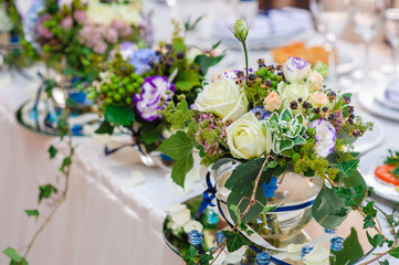 beautiful decorations of flowers at the wedding table