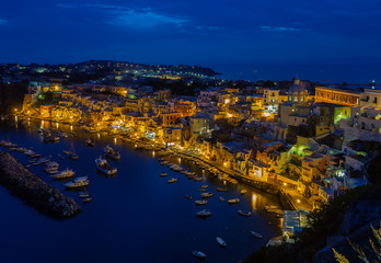 Fototapeta na wymiar Aerial view at night of Corricella on the Italian island Procida.