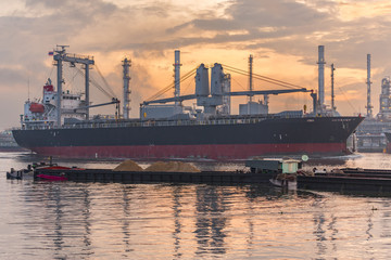 Cargo Ship beside the Oil Refinery, in the Bangchak area of Phra