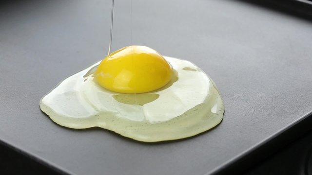 Crack eggs on electric barbecue, preparation process
