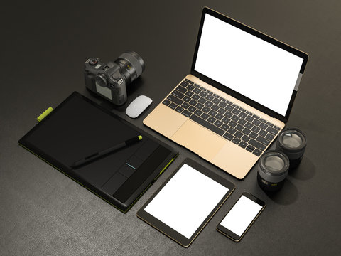 Designer accessories and gadgets on black leather background