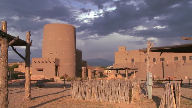A beautiful time lapse shot of clouds moving over a traditional New Mexico adobe.