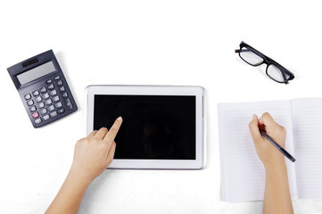 Learner hand touching tablet screen