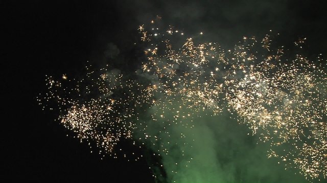 A fireworks show produces sparkling brightness.