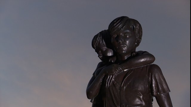 eCU Boys Town statue at entrance