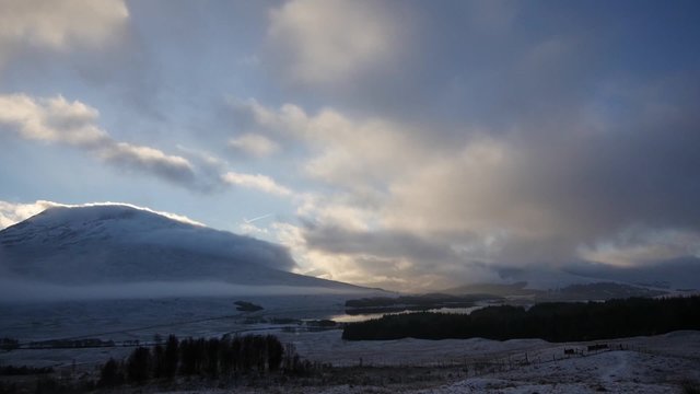 timelapse of cloudy skies and sunset over loch tulla and rannoch moor