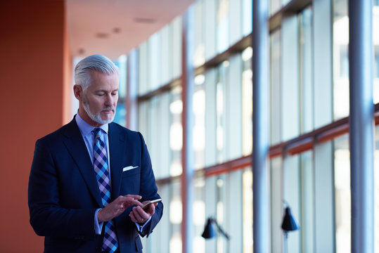 senior business man talk on mobile phone