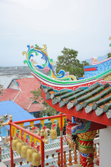 Obraz premium chinese roof with gold bell