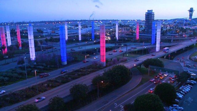 The colorful lights of Los Angeles International airport glow in the dark.
