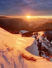 Fotobehang Majestic sunset in the winter mountains landscape. Dramatic sky © TTstudio
