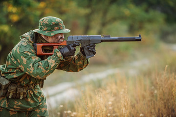 russian soldier in the battlefield with a rifle