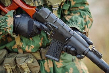 russian soldier in the battlefield with a rifle