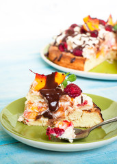 Cake with peaches and raspberries