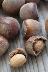 hazelnuts on wooden background