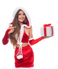 Beautiful and emotional Santa girl in Christmas swimsuit with pr