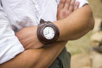 old leather watch on a male hand