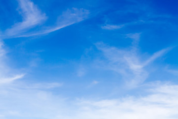 Naklejka na ściany i meble Blue sky background with white clouds.Blur or Defocus image.