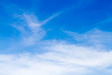 Blue sky background with white clouds.Blur or Defocus image.
