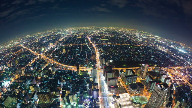 Timelapse video of Osaka in Japan at night, fisheye aerial view