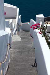 steps and Aegean sea in Oia, Santorini, Greece