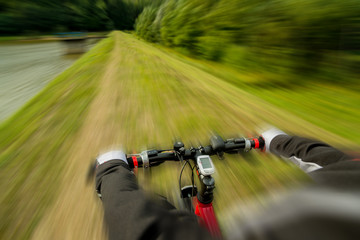 Obraz premium Young biker woman's speed riding.