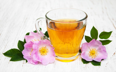 Cup of tea and dogrose