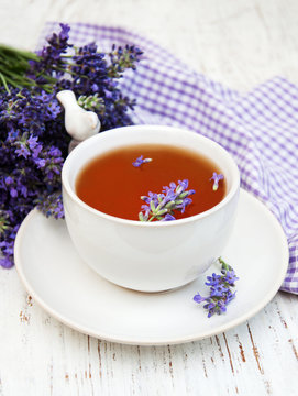 Cup of tea and lavender flowers