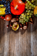 Autumn fruit and vegetable on wooden table 
