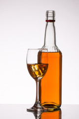 Red Wine bottle and glass on white background 