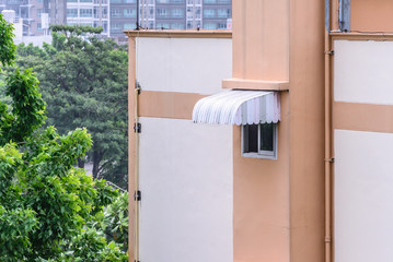 Rainproof awning of slide window. © Eakkaluk