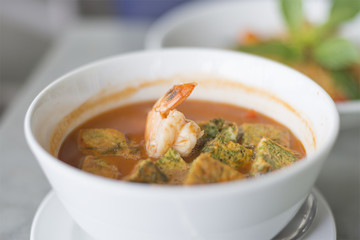 Delicious thai traditional food .Shrimp sour soup with fried egg made of tamarind paste.select focus.