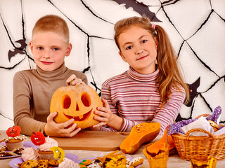 Fototapeta premium Halloween party with children holding trick or treat.