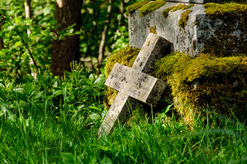 Stone cross in graveyard