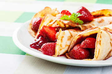 Traditional crepes served with strawberries